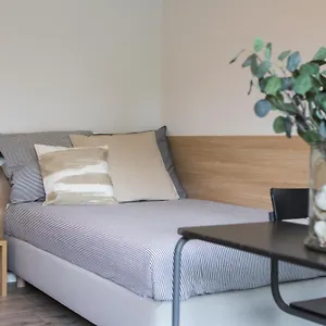 & Coliving Aparthotel
